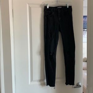 Black distressed skinny jeans